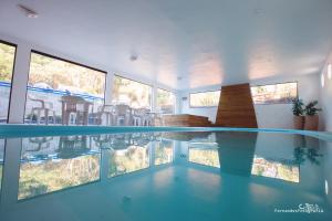 Bazén v ubytování Hotel Sandrini nebo v jeho okolí