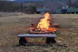 a fire pit in the middle of a field at Bondyrz 134 in Bondyrz