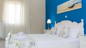 Posteľ alebo postele v izbe v ubytovaní Rose Residence-360º sea view