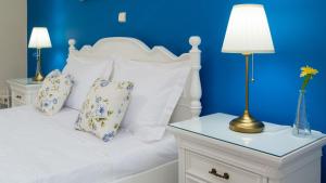 Posteľ alebo postele v izbe v ubytovaní Rose Residence-360º sea view