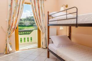 Posteľ alebo postele v izbe v ubytovaní Rose Residence-360º sea view