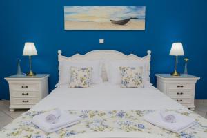 Posteľ alebo postele v izbe v ubytovaní Rose Residence-360º sea view