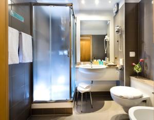 Koupelna v ubytování Hotel La Perla
