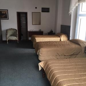 Cama o camas de una habitación en Hostal Chordeleg