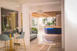 a living room with a couch and a table at Hotel San Pietro in Maiori