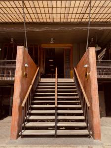a set of stairs leading to a building at The Lark Inn & Kitchen in San Juan