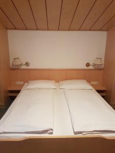 Voodi või voodid majutusasutuse Apartpension Kappacher toas