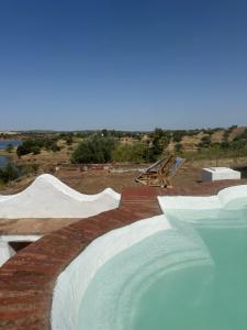 a skateboard park with a pool in the middle at Herdade Monte da Tapada in Alqueva
