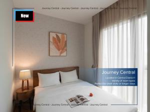 a magazine page of a bedroom with a bed and a window at Journey Central - ZENITY & D1 MENSION in Ho Chi Minh City