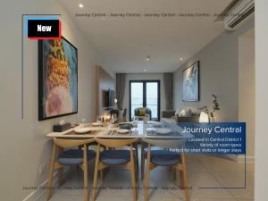 a dining room with a table and chairs at Journey Central - ZENITY & D1 MENSION in Ho Chi Minh City +22 photos