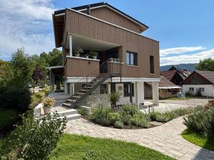 a house with a staircase in the front of it at Bodensee Apartment Lindau in Lindau