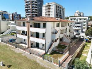 an apartment building in the middle of a city at Smith 3B in Lido degli Estensi