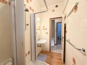 a bathroom with a shower and a sink and a toilet at Villette Astoria in Lido degli Estensi +30 photos