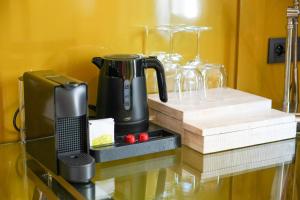 a coffee maker on a counter in a kitchen at Les Nuits in Antwerp