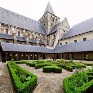 an exterior view of a building with a garden at Brunhilde in Montivilliers