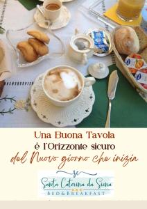 a table with a cup of coffee and a plate of pastries at Santa Caterina da Siena B&B in Catania