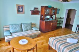Uma cama ou camas num quarto em (Ne)vinná kavárna