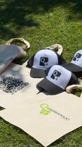a group of baseball caps sitting on the grass at Hotel Quadrifoglio in Caraglio