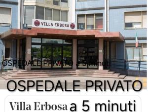 a building with the words villa erudicaalloc sqor istg at APARTMENT kitchen BOLOGNA in Bologna