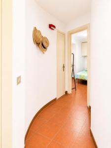a hallway with a room with a stuffed animal on the wall at Bella Maratea in Maratea