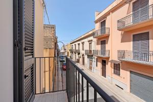 a view of an alley from a balcony at ByAma Holiday House in Menfi