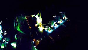 an aerial view of a city at night at Peev Apartments in Abuja