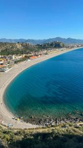 an aerial view of a beach and the ocean at D&F Guest House in Milazzo
