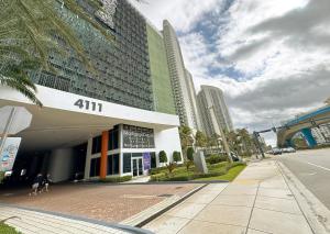 a building on a city street with tall buildings at Lyfe Resort Hollywood, Florida in Hollywood +99 photos