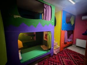 a room with a play room with a bunk bed at Shantihome in İzmir