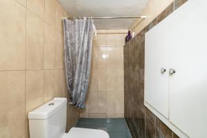 a bathroom with a toilet and a shower at Με συμπάθεια-With sympathy - private parking in Kavála +41 photos