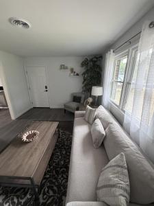 a living room with a couch and a table at Crewe Corner D in Crewe