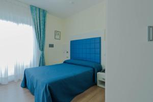 Postel nebo postele na pokoji v ubytování Park Hotel Perù ***S