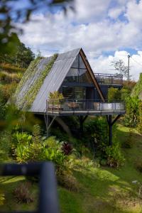 an image of a house with a roof at GRETEL CHALETS SUIZO in Guatapé