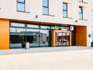 a store front of a building with glass doors at Premier Inn Mannheim City Centre in Mannheim