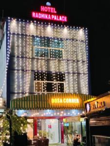 a hotel with christmas lights on top of it at Hotel Radhika Palace in Mirzāpur