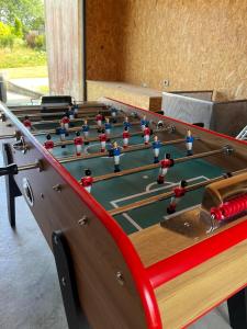 a group of billiard tables in a room at Chalet airelles in Saint-Pierre