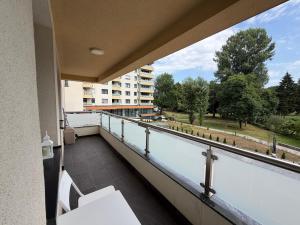 a balcony with a view of a building at Panamera Luxury Apartment Ilidža in Sarajevo