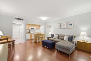 a living room with a couch and a table at 2479 Shipwatch in Kiawah Island