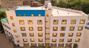 an overhead view of a white building with windows at The Chapter Hotel, Vasant Kunj in New Delhi