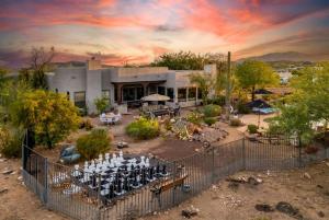 an aerial view of a wedding in front of a house at Desert Oasis Pool, Golf, Games Mountain Views in New River