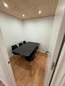 a meeting room with a table and chairs at Agasallo Cedeira in Cedeira