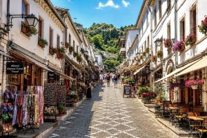 a street in an old town in italy at Anderr stone Boutique in Gjirokastër