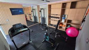 an overhead view of a fitness room with a gym at Hotel Cantera Respira Campo in Potrero de los Funes