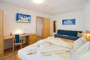 Telewizja i/lub zestaw kina domowego w obiekcie Aparthotel Alpendiamant Serfaus Wachter GmbH