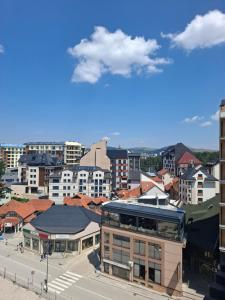 a view of a city with buildings at Zlatibor 1 Balkan Square in Zlatibor