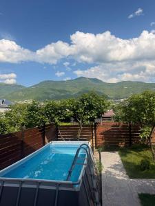 a swimming pool with a view of the mountains at NorWay1 in Ijevan