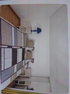 a stairwell with a blue object on top of it at Maison rollet in Aix-les-Bains