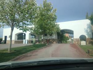 a dirt road in front of a building at By Lumina Parvasa 1 in Ejido Parras +7 photos