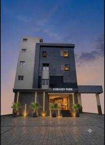 a large building with a store in front of it at EMBASSY PARK - Near US consulate, Apollo hospital, Sankaranethralaya in Chennai
