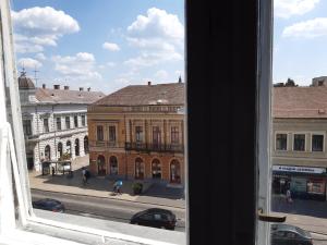 a view from a window of a city street at The Stage Door Apartment in Debrecen